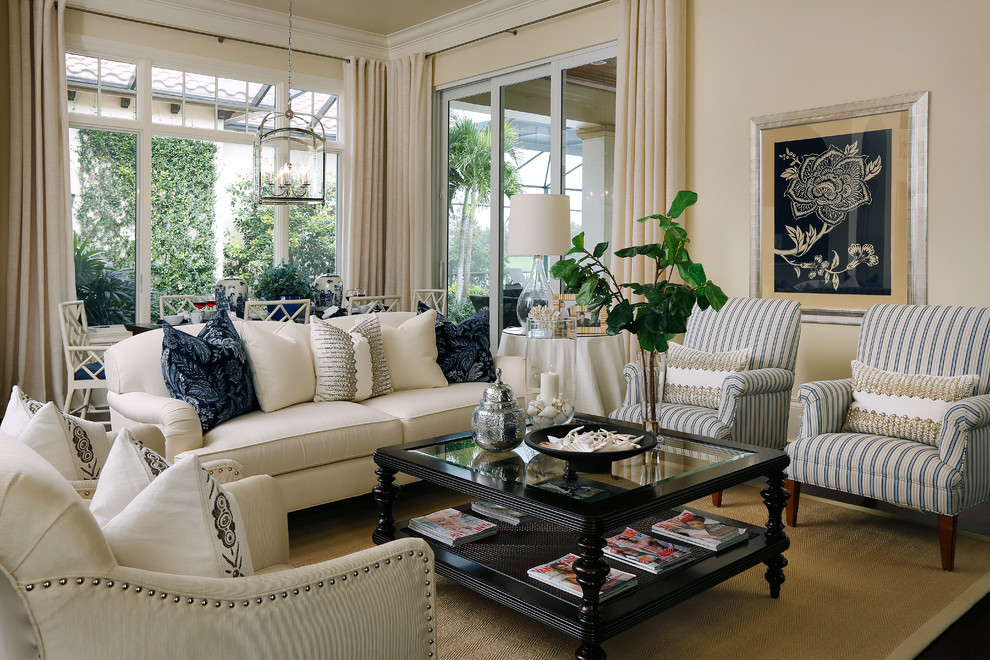 Example of a classic family room design in Miami with beige walls