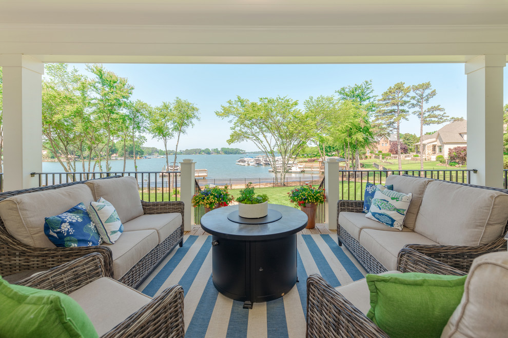 This is an example of a beach style verandah in Charlotte.
