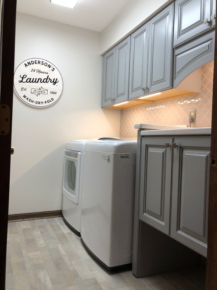 Small transitional laundry room photo in Cincinnati
