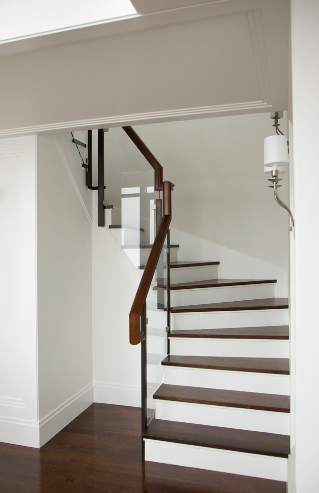This is an example of a medium sized contemporary staircase in Boston.