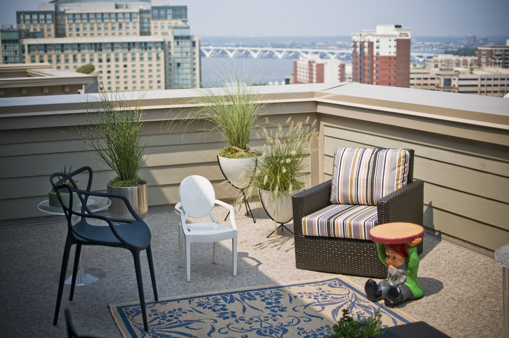 Inspiration for an eclectic rooftop deck in DC Metro with no cover.
