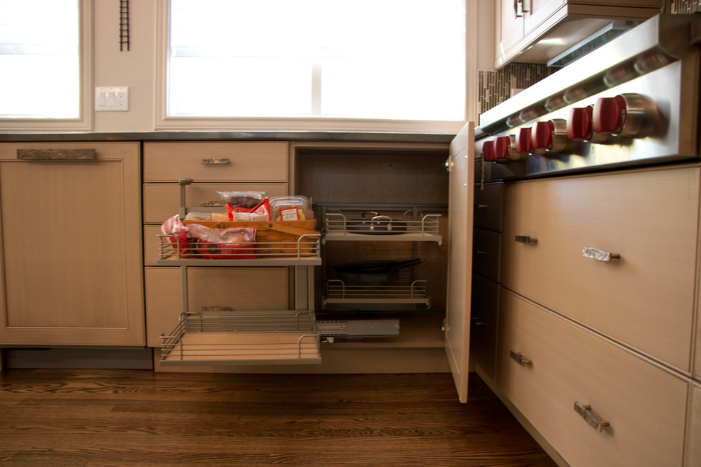 Example of a large transitional u-shaped open concept kitchen design in Denver with shaker cabinets, beige cabinets, granite countertops, multicolored backsplash and an island