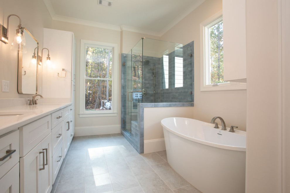 This is an example of a transitional bathroom in Atlanta with an alcove shower.