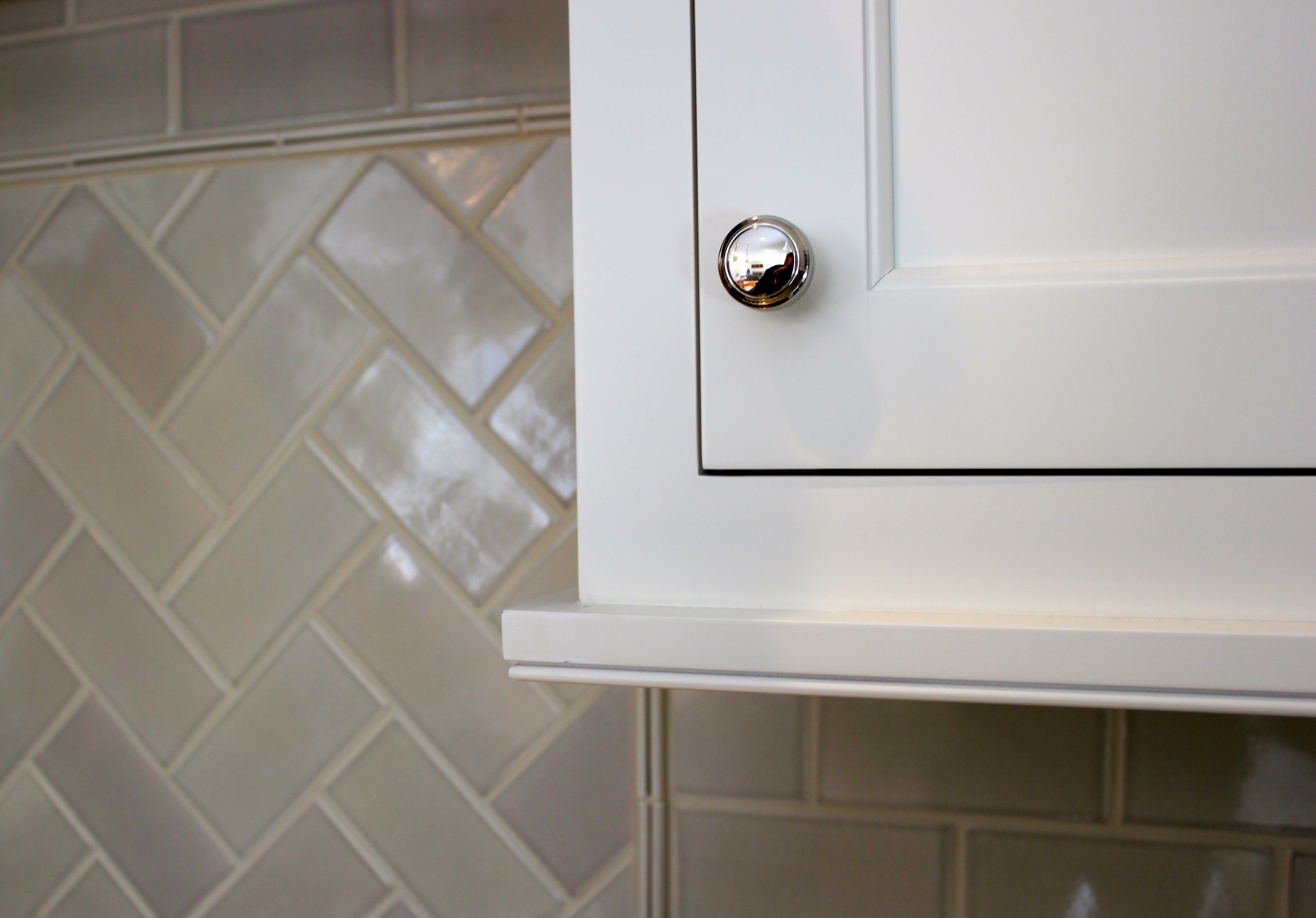 Inset Cabinet & Herringbone Backsplash Detail