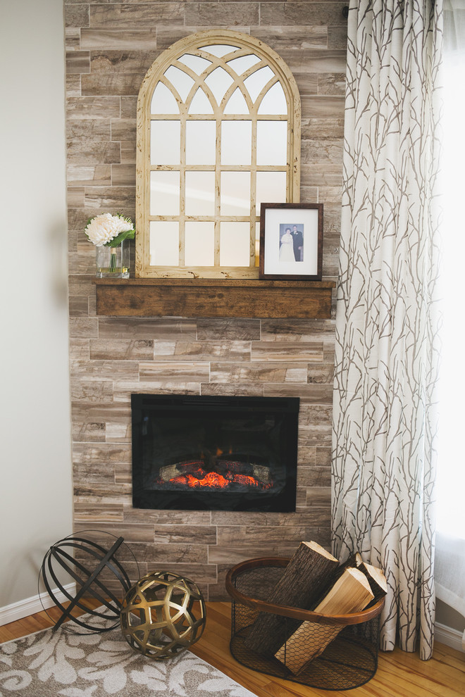 Inspiration for a mid-sized transitional formal and enclosed light wood floor home design remodel with beige walls, a corner fireplace, a tile fireplace and no tv