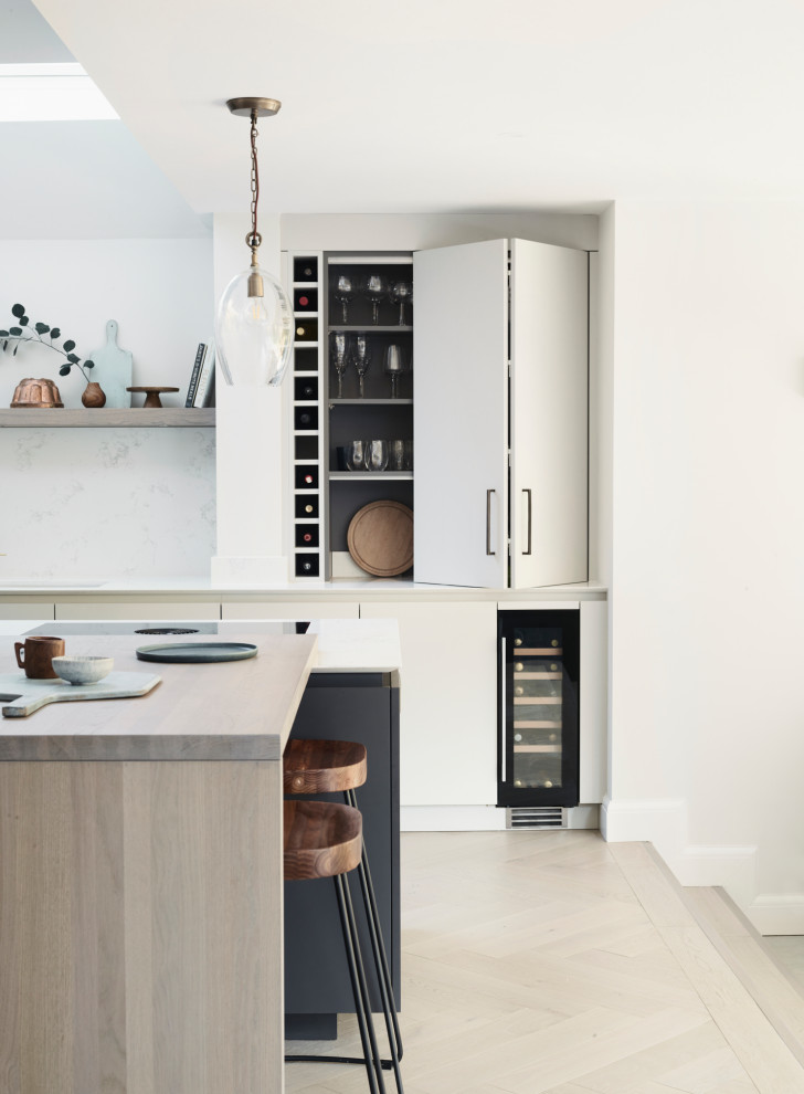 This is an example of a contemporary home bar in London.