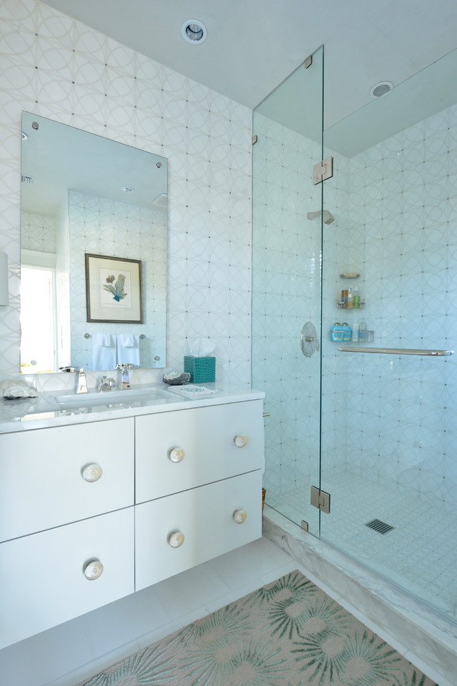Photo of a contemporary bathroom in Dallas with flat-panel cabinets and white cabinets.