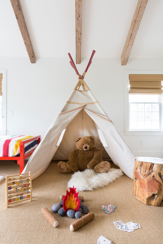 Photo of a country kids' room for boys in New York with white walls and beige floor.