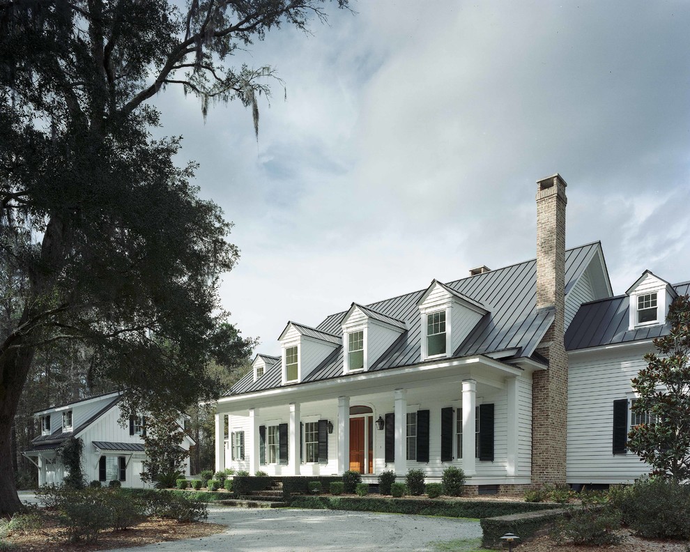 Design ideas for a traditional two-storey white exterior in Atlanta.