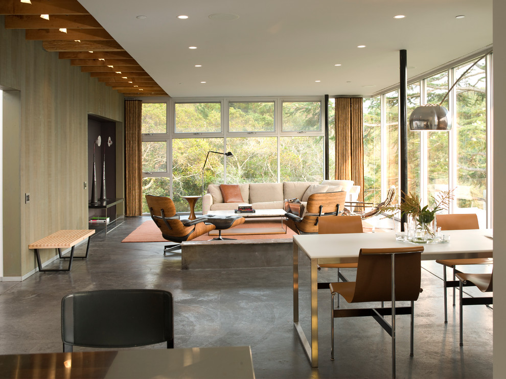Modern dining room in San Francisco with concrete floors.
