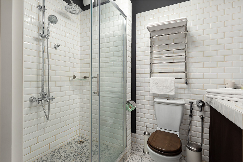 This is an example of a mid-sized scandinavian 3/4 wet room bathroom in Saint Petersburg with open cabinets, brown cabinets, a two-piece toilet, white tile, ceramic tile, white walls, ceramic floors, a drop-in sink, tile benchtops, beige floor, a sliding shower screen and white benchtops.