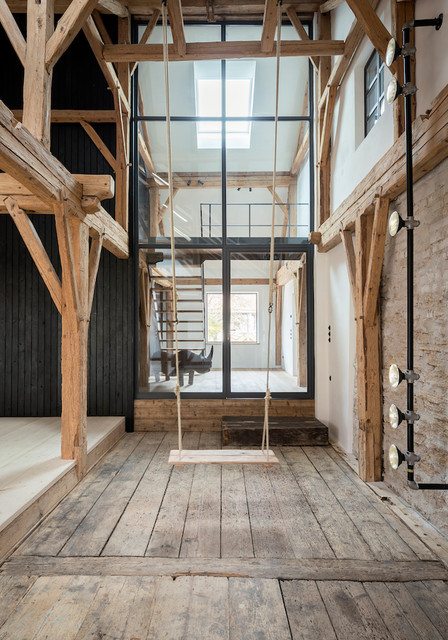 Scheune mit moderner Glasfassade - Rustikal - Wohnbereich - München