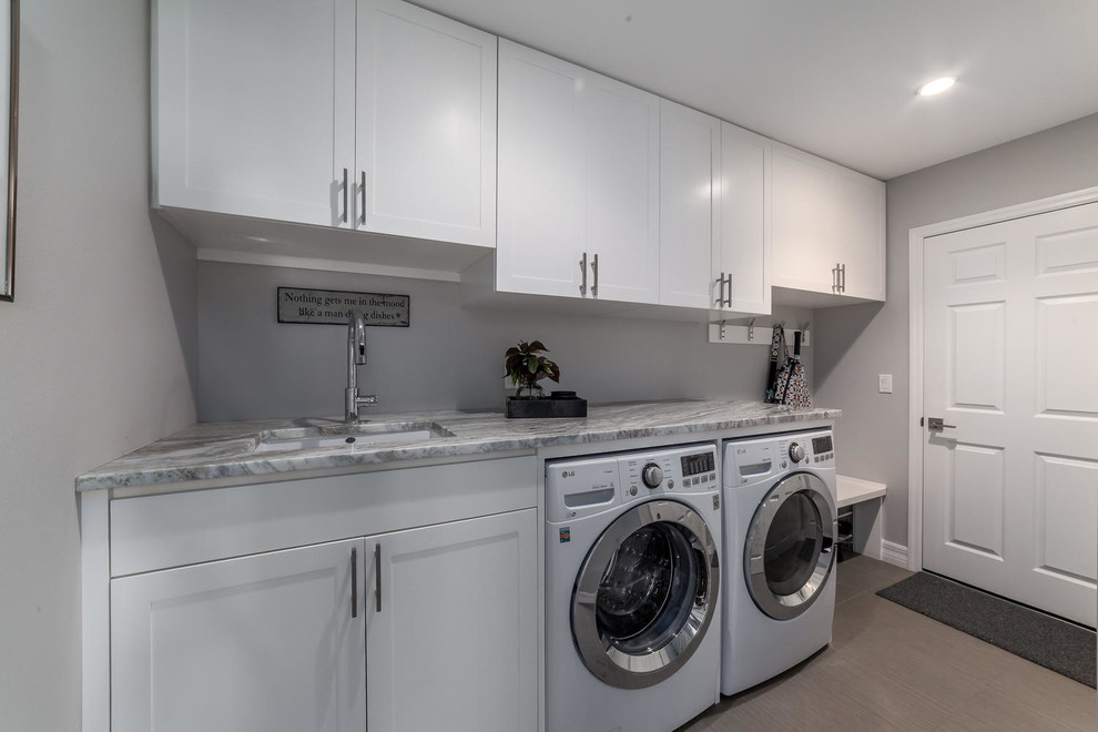 Contemporary laundry room in Tampa.