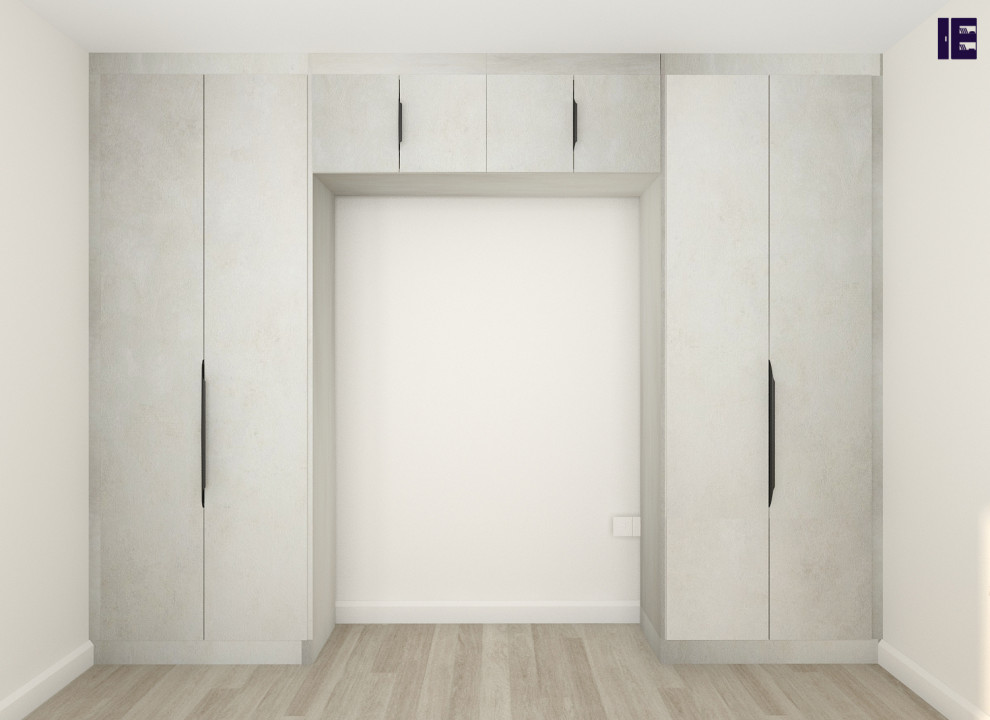 Design ideas for a small contemporary storage and wardrobe in London with flat-panel cabinets and white cabinets.