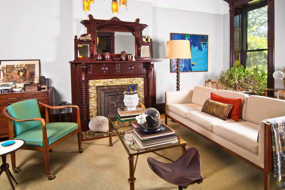 Design ideas for an eclectic living room in New York with grey walls and a standard fireplace.