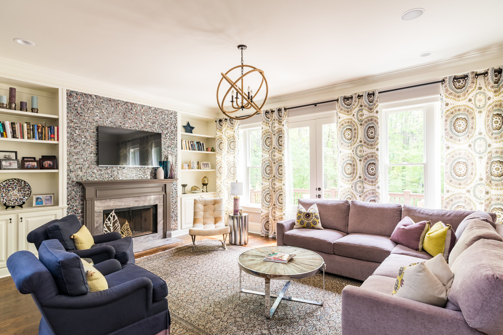 Inspiration for an expansive transitional open concept family room in Atlanta with dark hardwood floors, a standard fireplace, brown floor, grey walls, a tile fireplace surround and a wall-mounted tv.