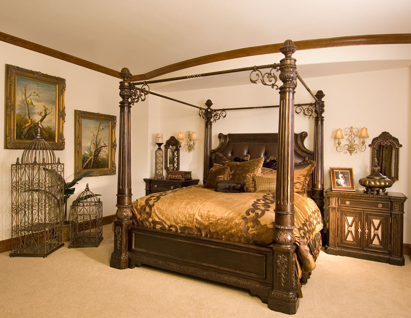 Inspiration for a large traditional master bedroom in Other with beige walls and carpet.