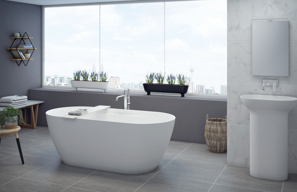 Ispirazione per una stanza da bagno padronale minimal di medie dimensioni con vasca freestanding