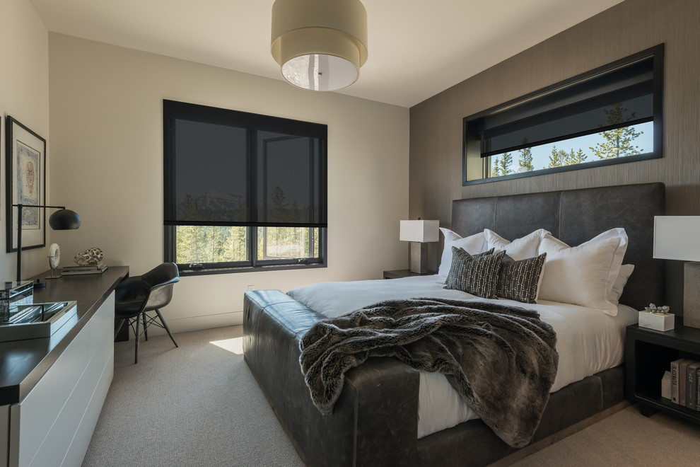 Example of a mid-sized trendy master carpeted and beige floor bedroom design in Other with beige walls and no fireplace