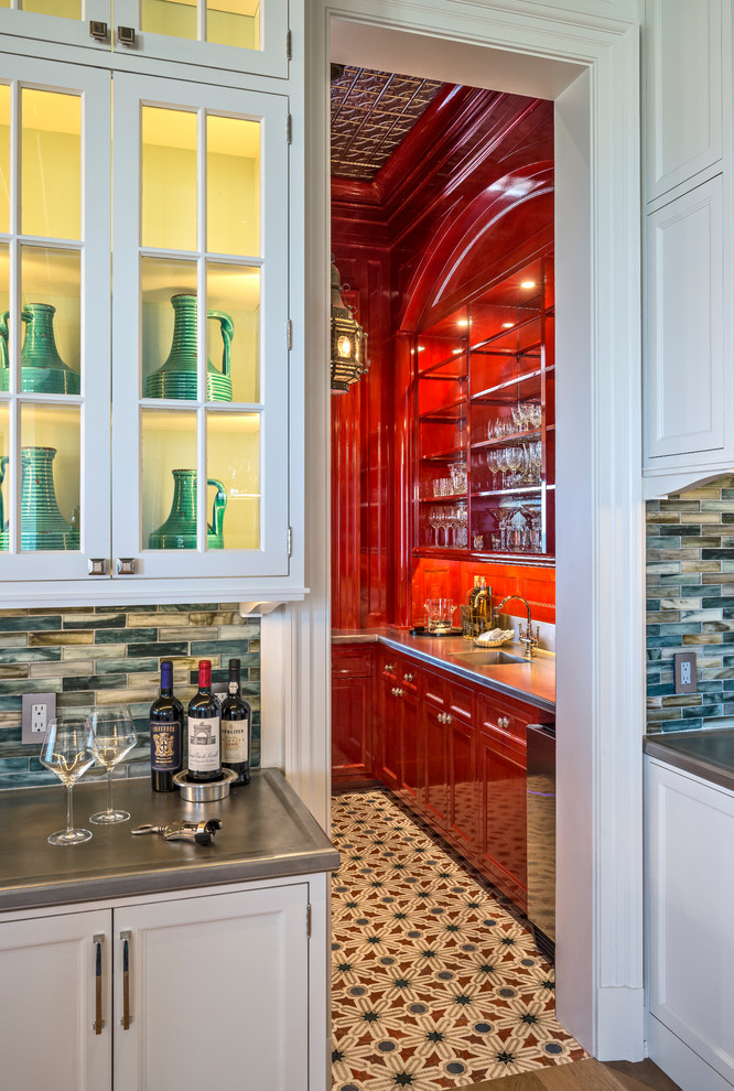 Inspiration for a mid-sized traditional galley wet bar in Providence with an integrated sink, recessed-panel cabinets and red cabinets.