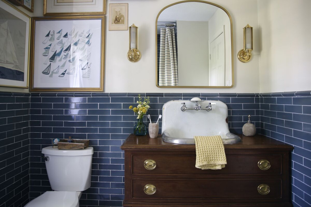 Design ideas for a mid-sized beach style bathroom in Raleigh with an alcove shower, blue tile, ceramic tile, ceramic floors and multi-coloured floor.
