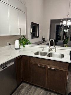 Stained maple lowers & painted uppers/pantries; Calacatta quartz countertops