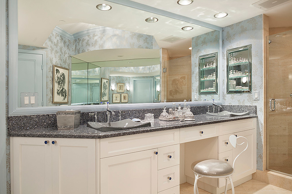 This is an example of an expansive transitional 3/4 bathroom in Miami with blue walls, a drop-in sink, white cabinets, beige tile, recessed-panel cabinets, terrazzo benchtops, beige floor, a hinged shower door and grey benchtops.