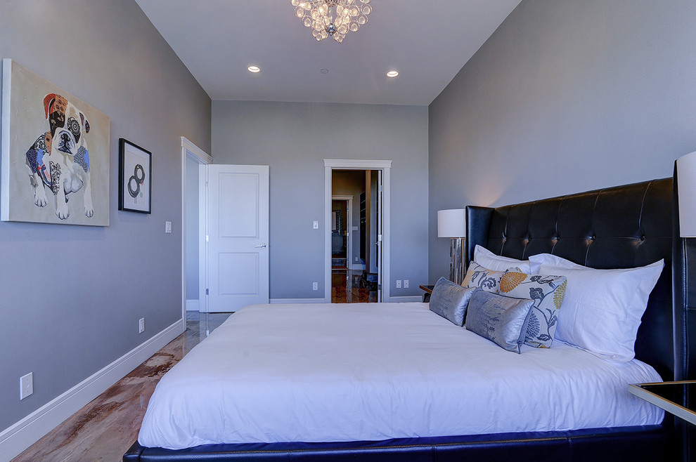 Mid-sized contemporary master bedroom in Edmonton with grey walls, concrete floors, no fireplace and multi-coloured floor.