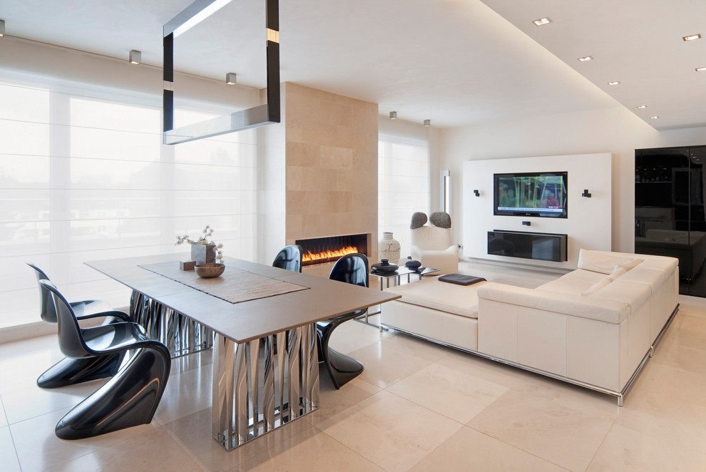 Inspiration for a large contemporary formal open concept living room in Cologne with white walls, a ribbon fireplace, a wall-mounted tv, limestone floors and a tile fireplace surround.