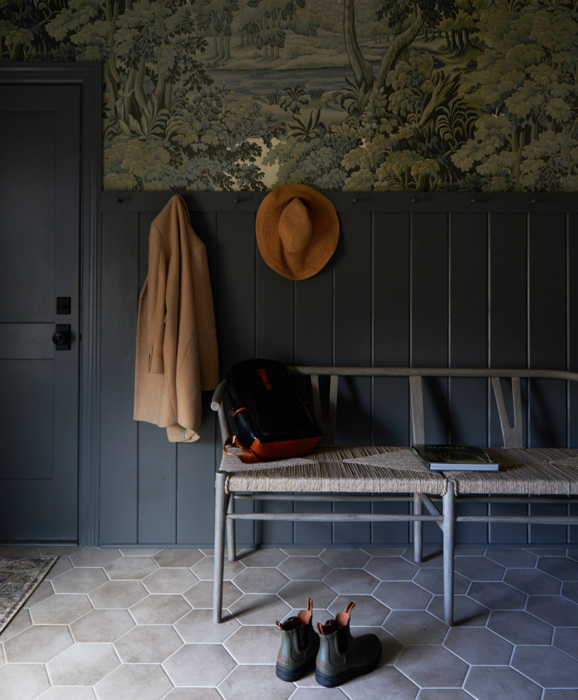 Country entryway in Chicago with multi-coloured walls, a single front door, a black front door, grey floor, decorative wall panelling and wallpaper.