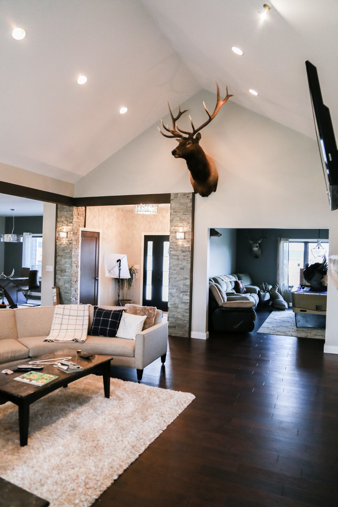 Example of a large transitional home design design