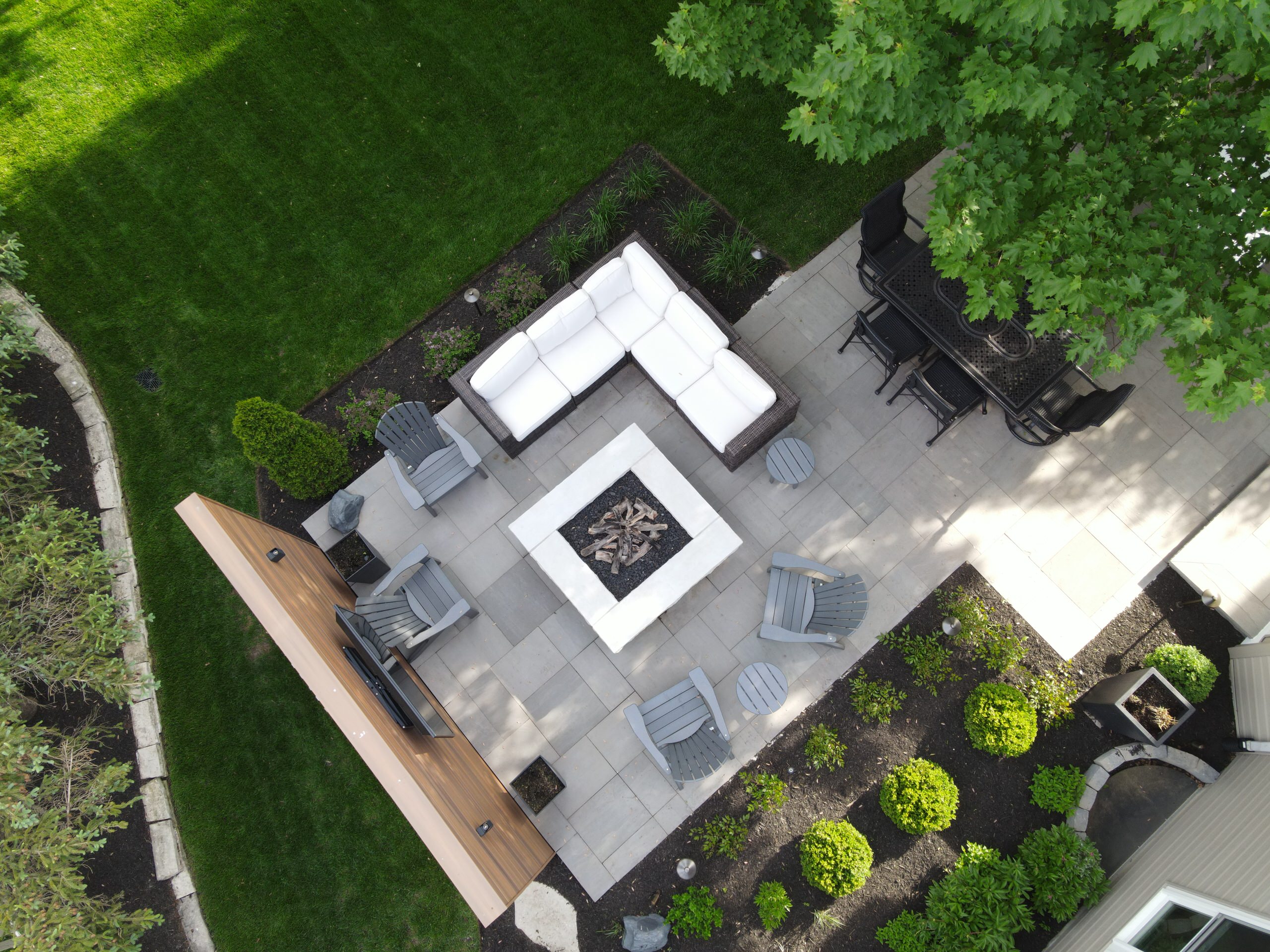 Outdoor Great Room featuring TV & Gas Fire Pit