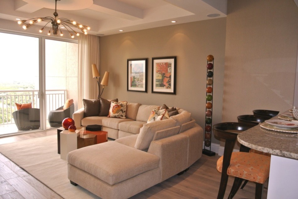 This is an example of a contemporary family room in Miami.