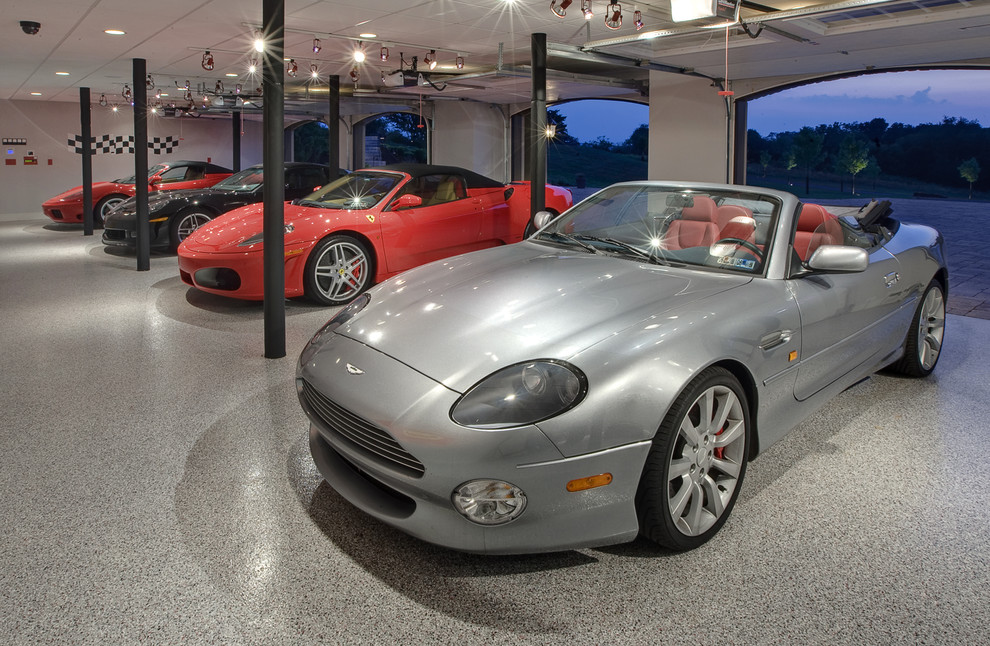 Photo of a contemporary four-car garage in Other.