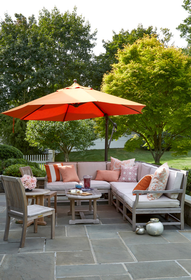 Photo of a large transitional backyard patio in New York.