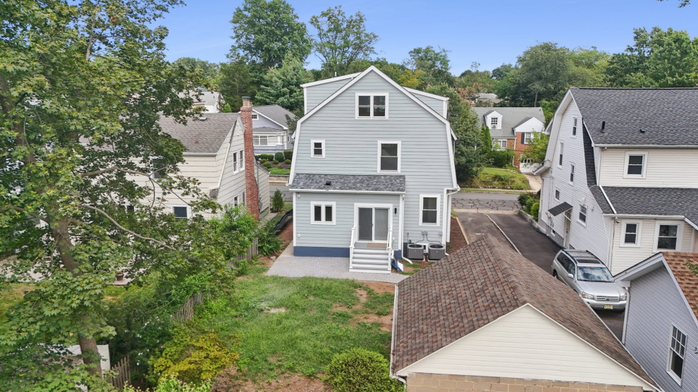 Aerial Rear View of Gambrel-Roof Home