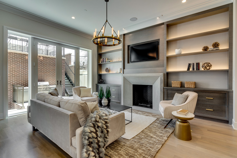 Inspiration for a contemporary open concept living room in Chicago with a stone fireplace surround, grey walls, light hardwood floors, a standard fireplace, a wall-mounted tv and beige floor.