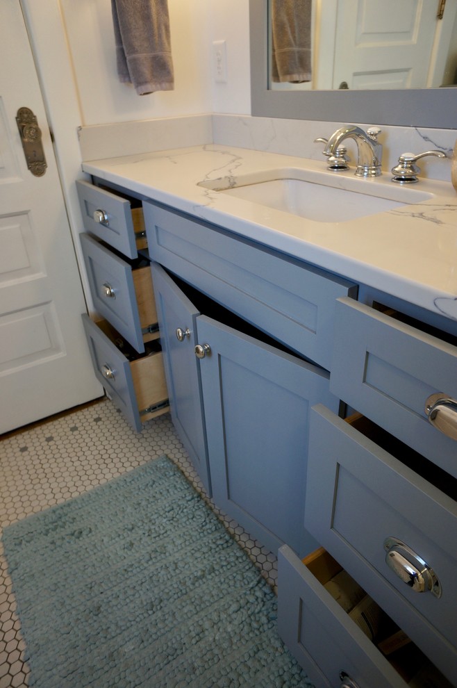 Photo of a small traditional master bathroom in Minneapolis with shaker cabinets, grey cabinets, a two-piece toilet, white tile, subway tile, white walls, mosaic tile floors, an undermount sink, engineered quartz benchtops, a shower curtain, an alcove tub, a shower/bathtub combo, white floor, white benchtops, a single vanity and a freestanding vanity.