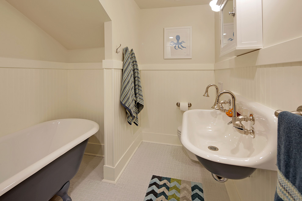 Mid-sized traditional kids bathroom in Seattle with a claw-foot tub, a two-piece toilet, white tile, white walls, mosaic tile floors, a wall-mount sink, white floor and a shower curtain.