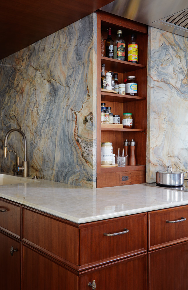 Example of a huge transitional dark wood floor open concept kitchen design in Chicago with flat-panel cabinets, medium tone wood cabinets, solid surface countertops, multicolored backsplash, stone slab backsplash, stainless steel appliances and an island
