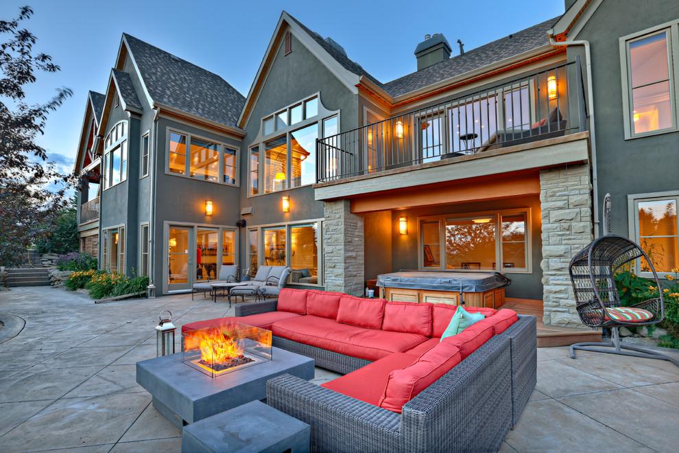 Contemporary patio in Calgary with a fire feature and no cover.