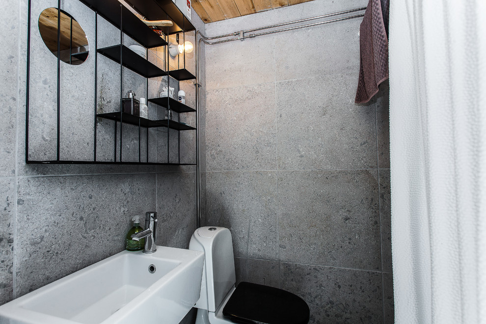 This is an example of an industrial powder room in Stockholm.