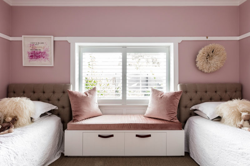 Inspiration for a mid-sized beach style kids' room for girls in Sydney with pink walls, carpet and grey floor.