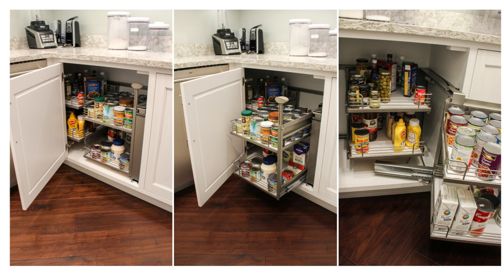 Huge transitional l-shaped dark wood floor kitchen pantry photo with a single-bowl sink, shaker cabinets, white cabinets, quartzite countertops, gray backsplash, ceramic backsplash, stainless steel appliances and two islands