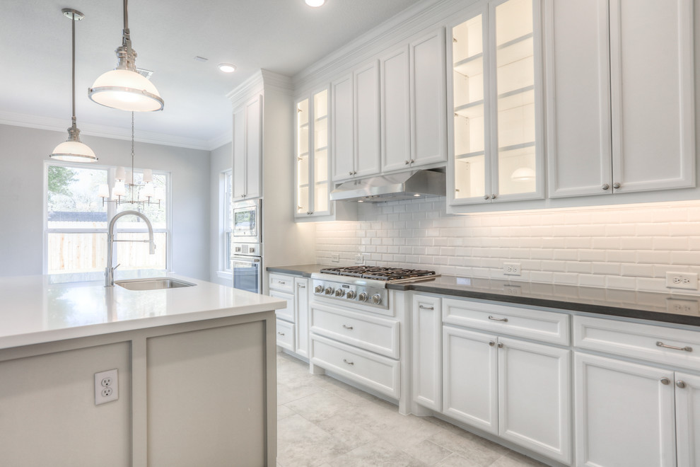 Example of a transitional kitchen design in Houston