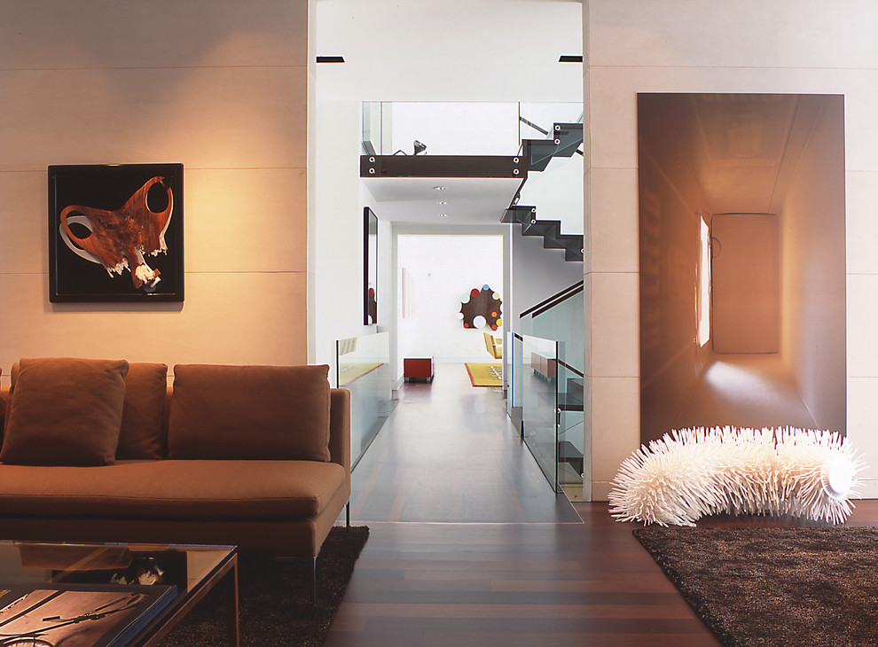 Inspiration for a contemporary hallway in DC Metro with white walls and dark hardwood floors.