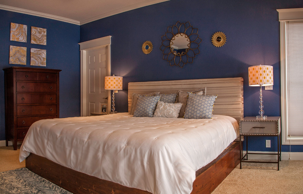 Design ideas for a mid-sized traditional master bedroom in Other with blue walls.