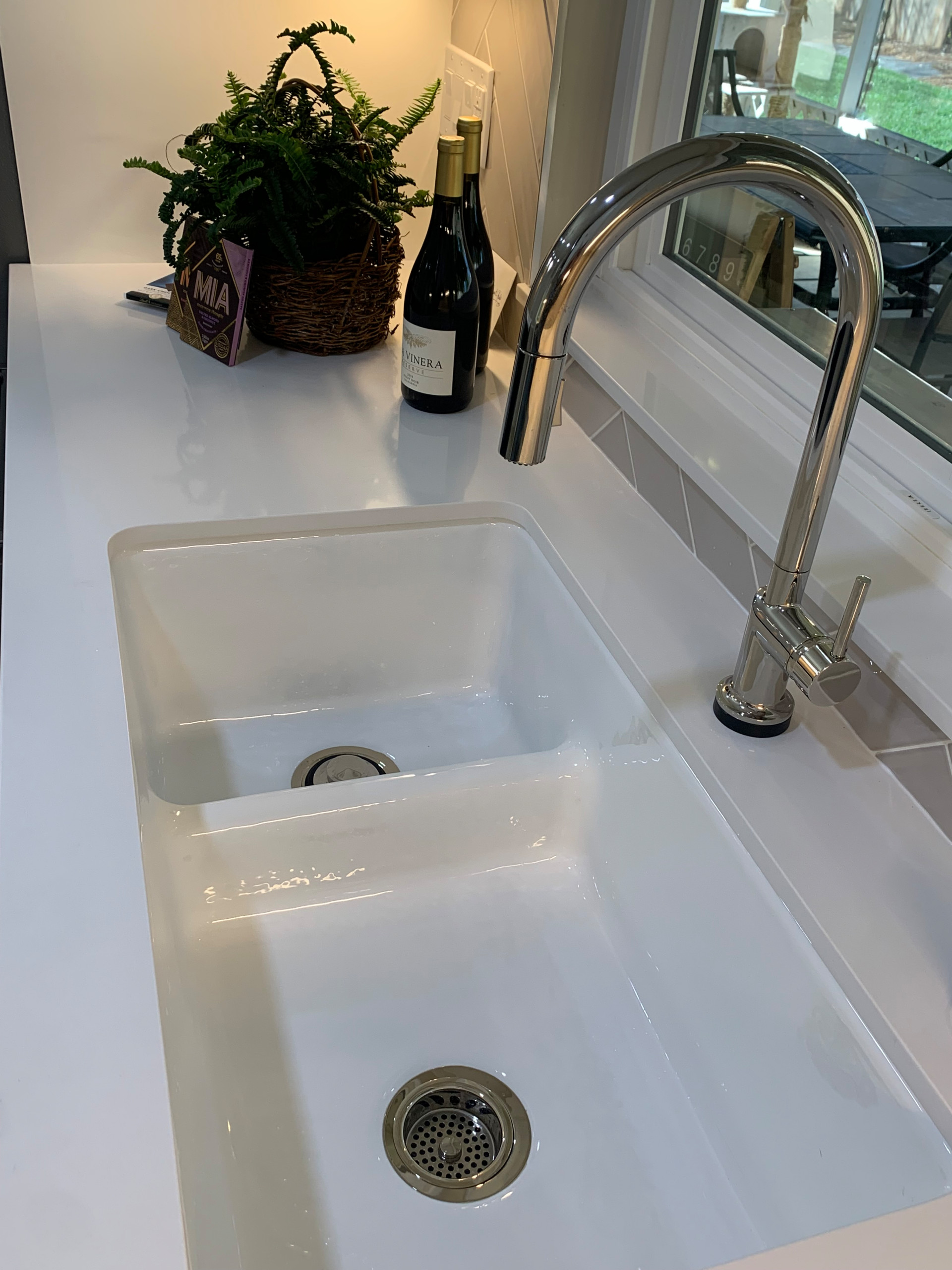 SMART DIVIDE KOHLER CAST IRON SINK, GORGEOUS POLISHED NICKEL FAUCET