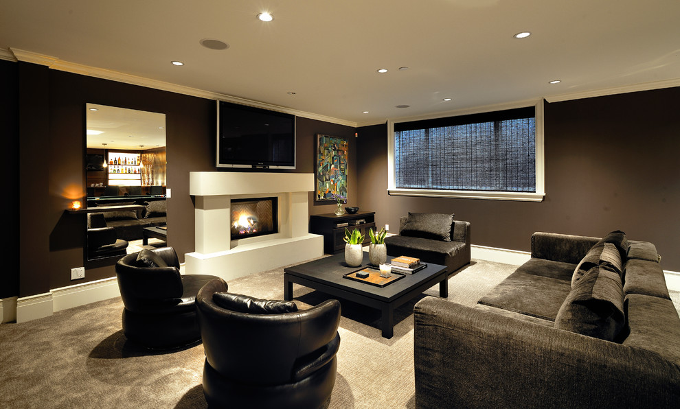 This is an example of a contemporary family room in Vancouver with grey walls.
