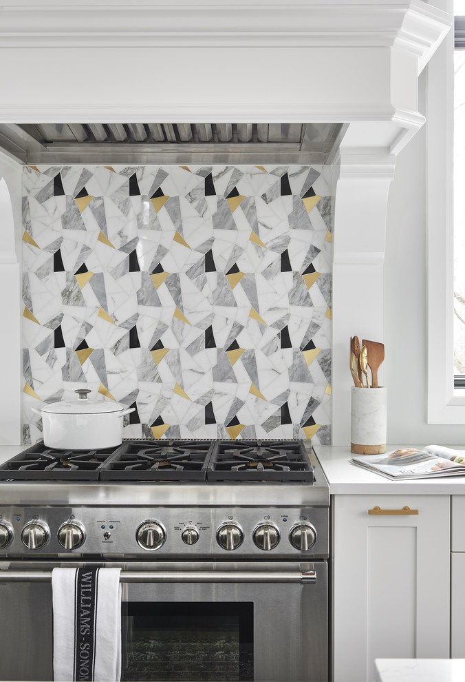 Example of a transitional kitchen design in Toronto